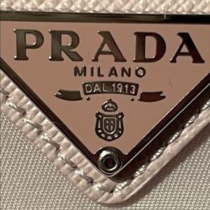 How to spot a fake Prada! Photo 1 is real 2 fake